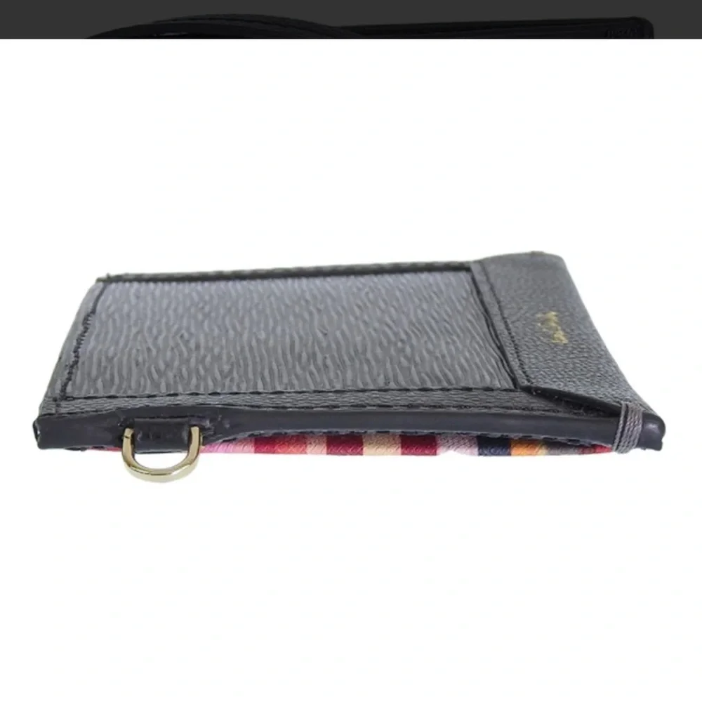 Check out Paul Smith!!Black Textured Leather card holder. NWOT.  Men or women’s